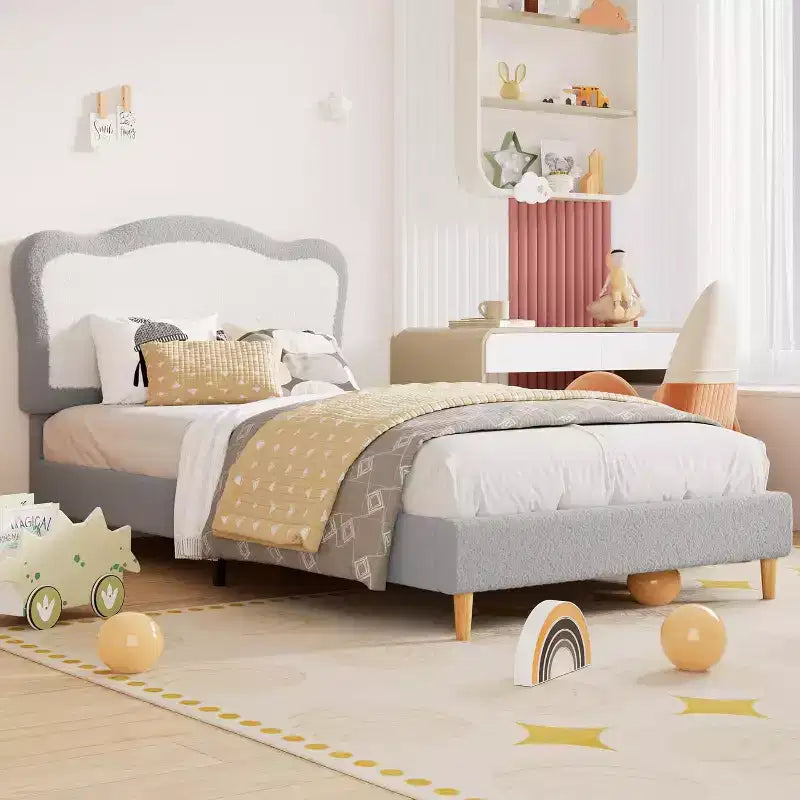 Struttura letto singolo imbottita per bambini con testiera a conchiglia