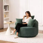 Poltrona girevole moderna con cuscini decorativi