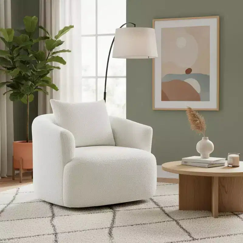Poltrona girevole a 360° con cuscino decorativo