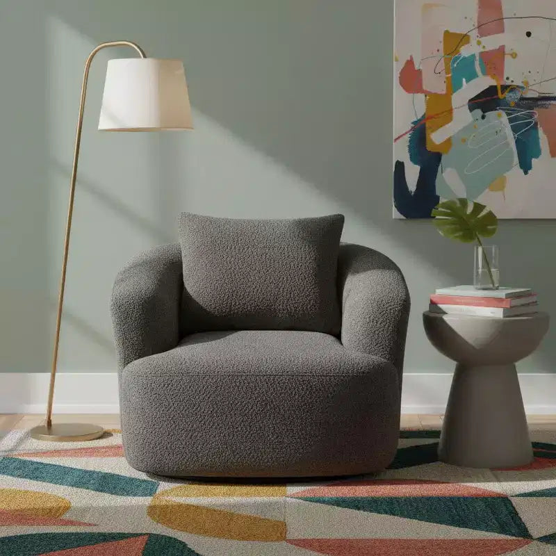 Poltrona girevole a 360° con cuscino decorativo