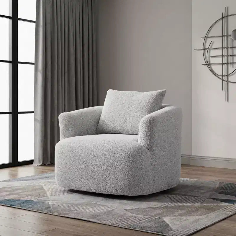 Poltrona girevole a 360° con cuscino decorativo