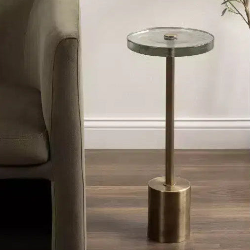 Tavolino rotondo in vetro con base in metallo